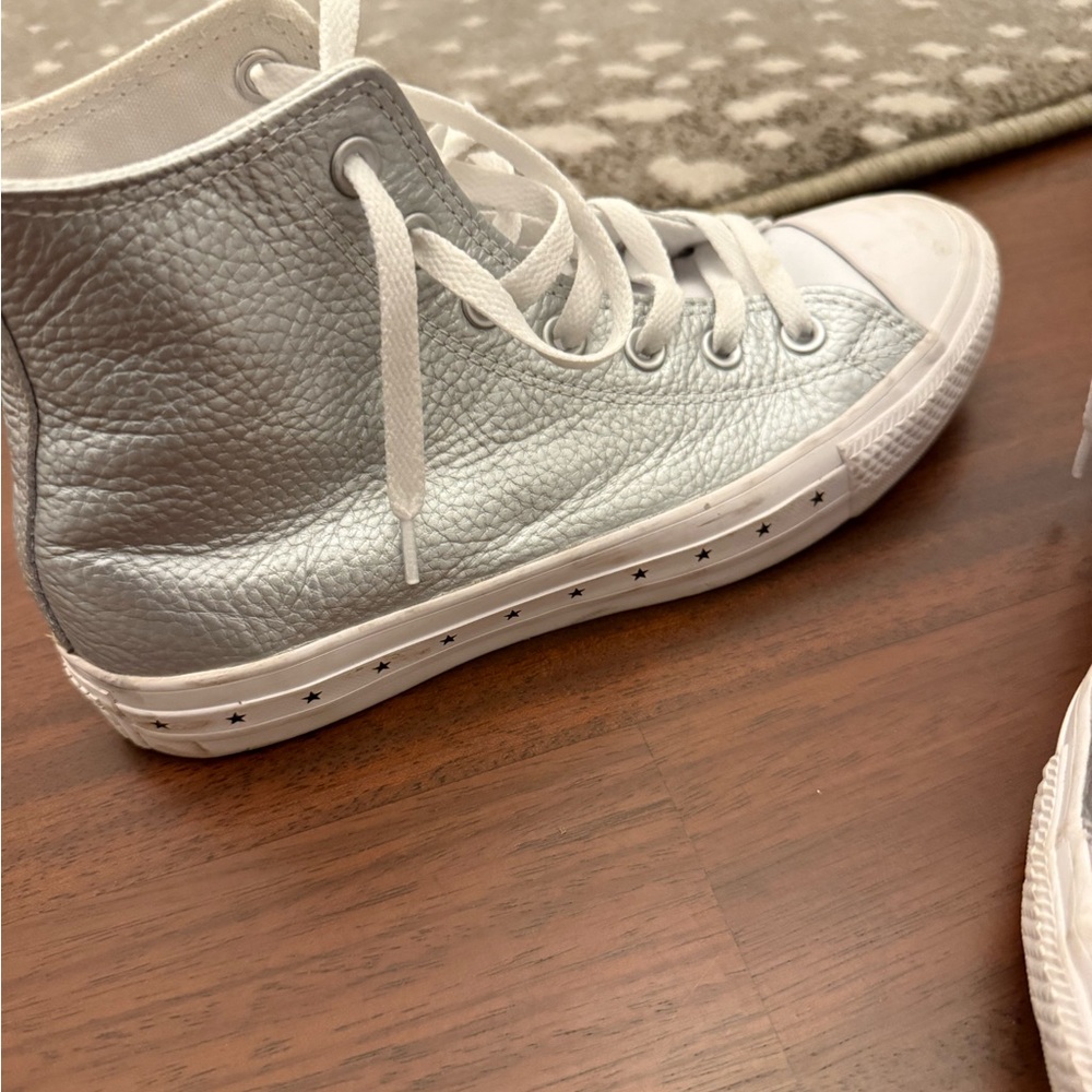Silver high tops Converse